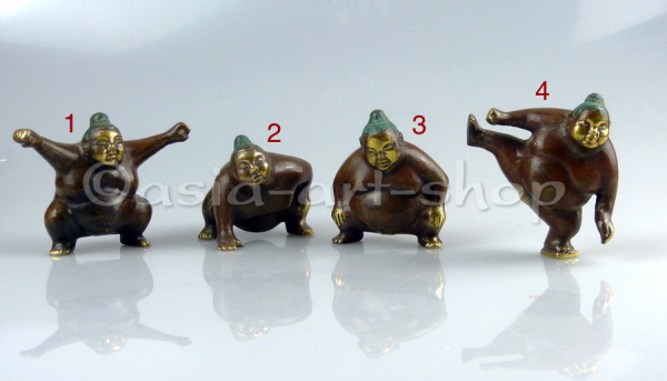 Bronze sumo wrestlers