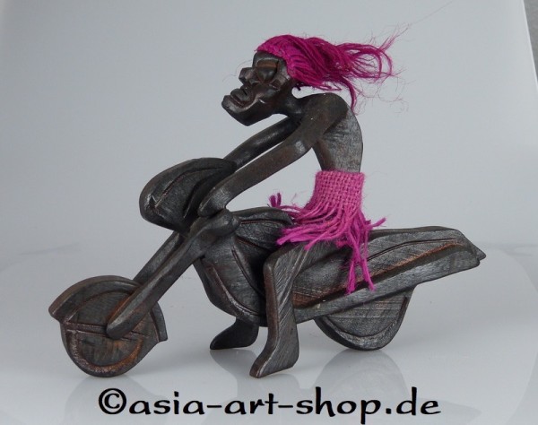 Asmat on motorcycle